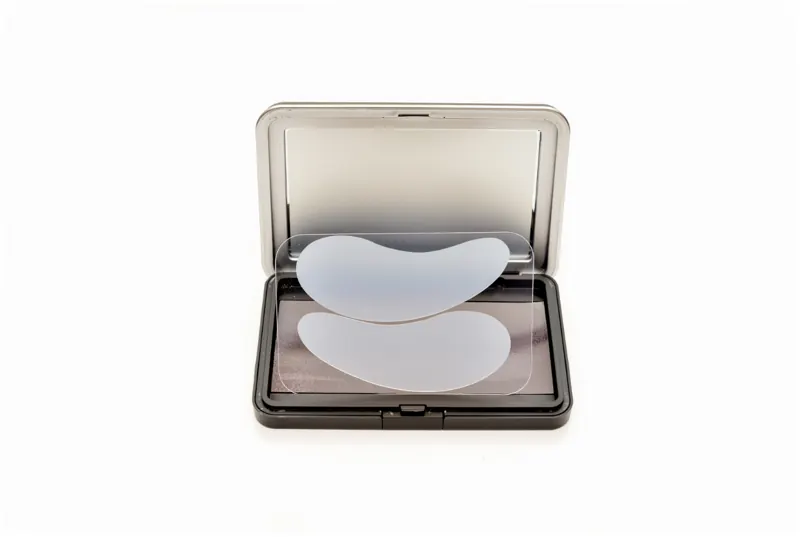 Clear reusable silicone under-eye patches in an open mirror box